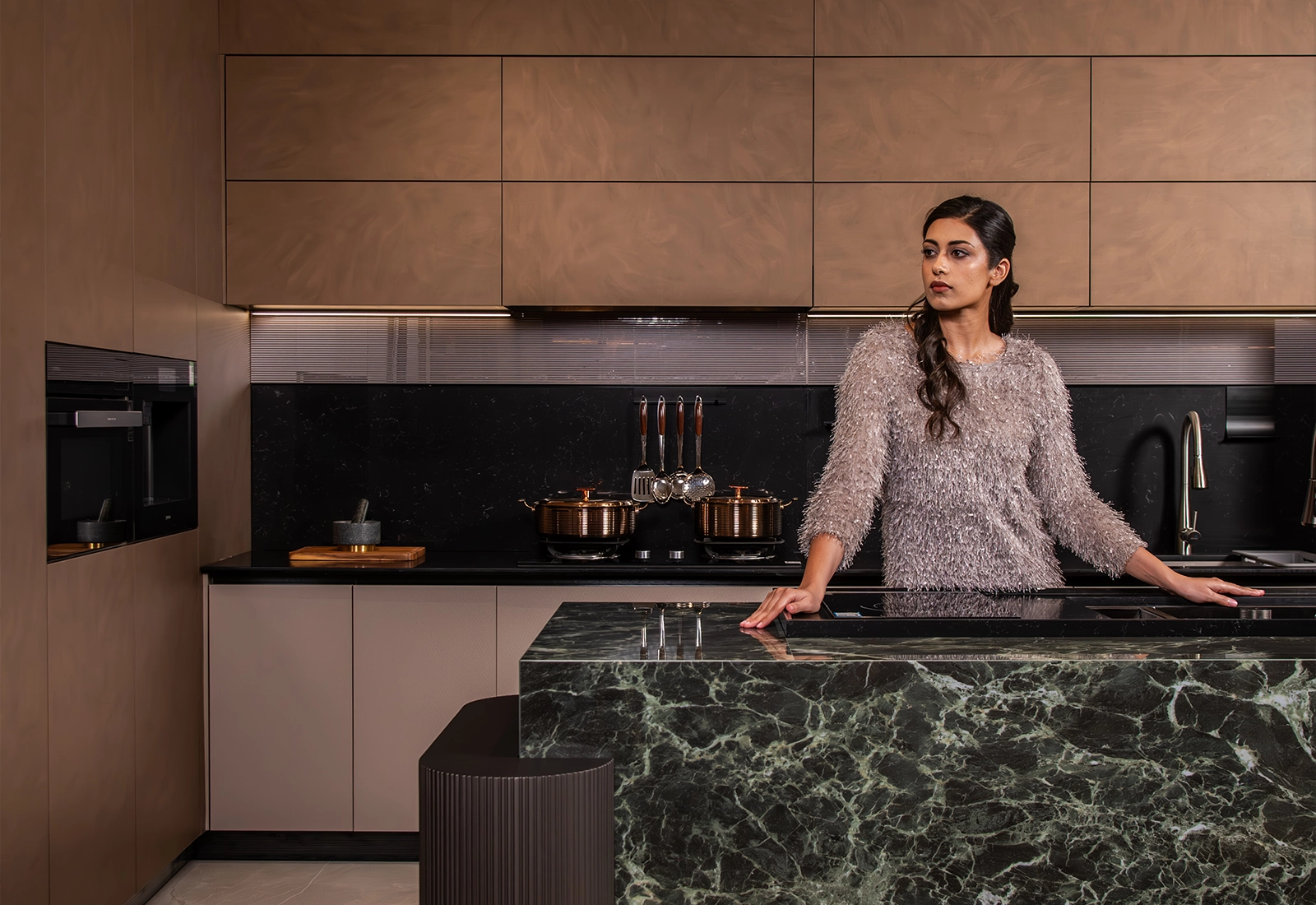 Handle-less modular kitchen in pale oak finish, Delhi NCR home